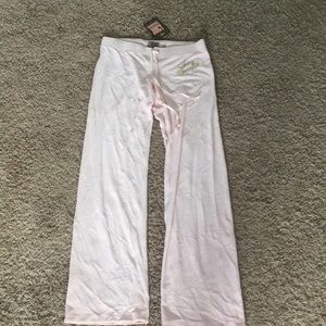 Juicy Couture light pink pants with gold